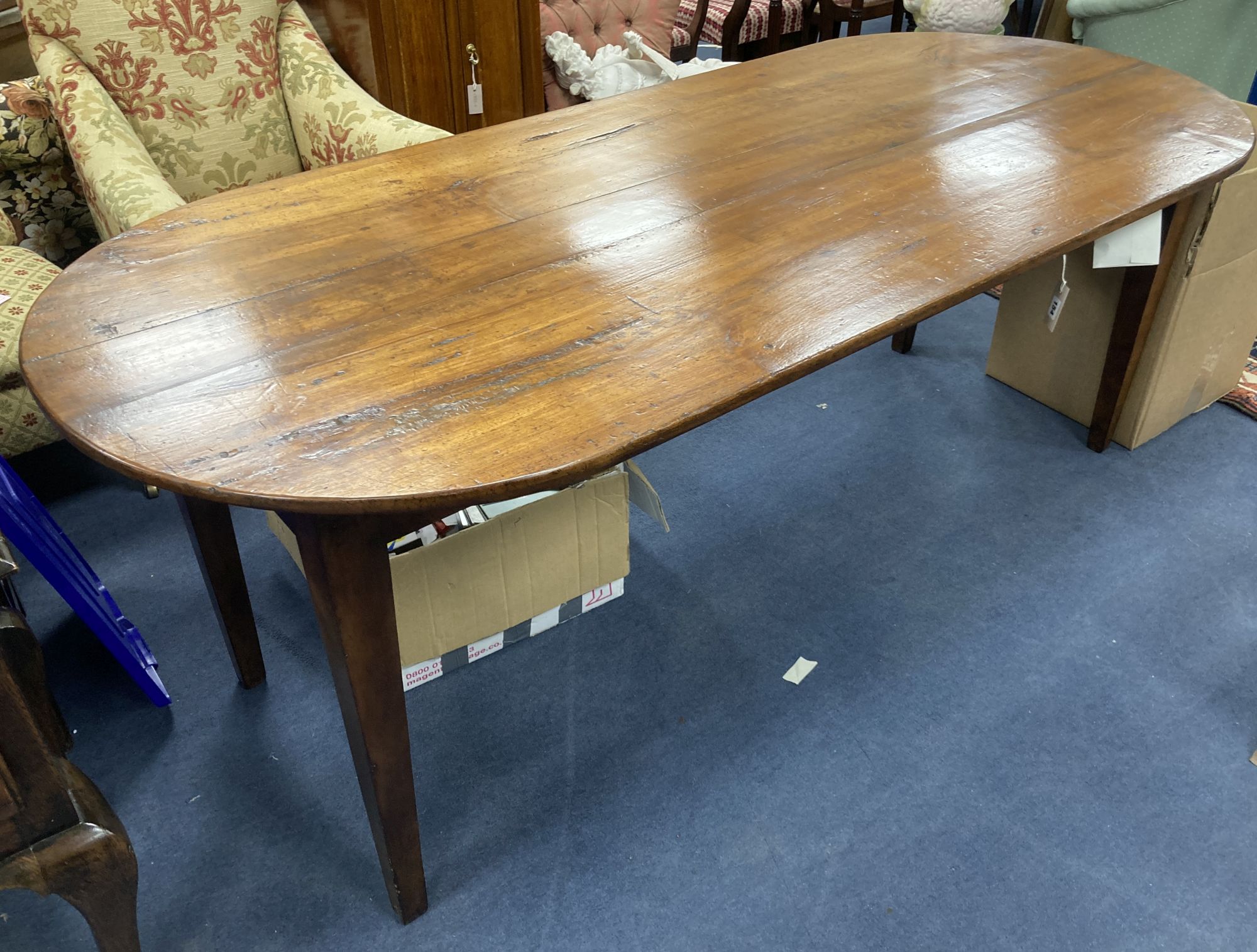 A 19th century fruitwood provincial dining table on square tapered legs, length 210cm, depth 90cm, height 77cm